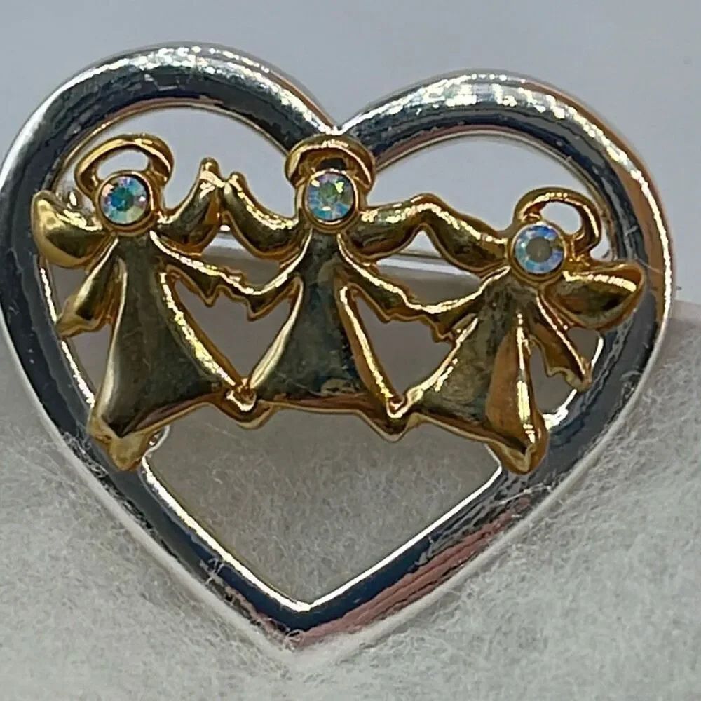 Vintage heart Angel trio Aura Borealis brooch.